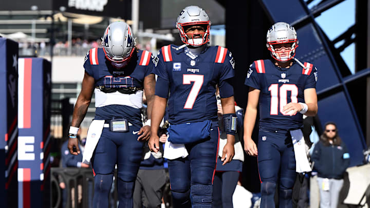 Oct 27, 2024; Foxborough, Massachusetts, USA; New England Patriots quarterback Joe Milton III (19), quarterback Jacoby Brissett (7), and quarterback Drake Maye (10) walk onto the field before a game against the New York Jets at Gillette Stadium. Mandatory Credit: Brian Fluharty-Imagn Images