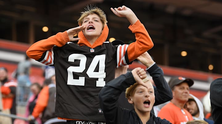 Oct 16, 2022; Cleveland, Ohio, USA; A pair of young Cleveland Browns fans boo the Browns as they walk off the field while also yelling for defensive coordinator Joe Woods to be fired after the Browns lost to the New England Patriots at FirstEnergy Stadium. Mandatory Credit: Lon Horwedel-Imagn Images