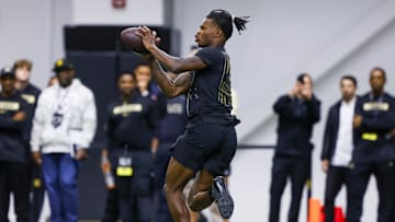 Apr 4, 2025; Boulder, CO, USA; Colorado Buffaloes wide receiver Travis Hunter (12) makes a catch at the University of Colorado NFL Showcase at the CU Indoor Practice Facility. Mandatory Credit: Michael Ciaglo-Imagn Images