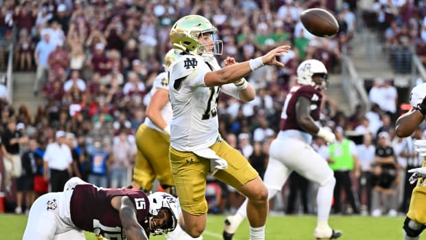 Riley Leonard throws a pass for Notre Dame against Texas A&M