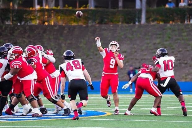 IMG_0178.jpeg Dash Beierly throws the ball for Mater Dei against Corona Centennial on Thursday, Aug. 22, 2024.