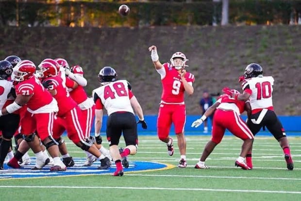 IMG_0178.jpeg Dash Beierly throws the ball for Mater Dei against Corona Centennial on Thursday, Aug. 22, 2024.