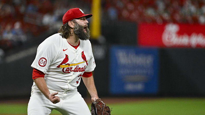 Sep 17, 2024; St. Louis, Missouri, USA;  St. Louis Cardinals starting pitcher Lance Lynn (31) reacts after an inning-ending double play against the Pittsburgh Pirates during the fifth inning at Busch Stadium.