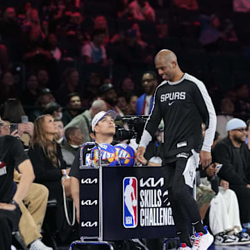 Feb 15, 2025; San Francisco, CA, USA; Team Spurs center Victor Wembanyama (1) of the San Antonio Spurs adn Team Spurs guard Chris Paul (3) of the San Antonio Spurs react after competing in the skills challenge during All Star Saturday Night ahead of the 2025 NBA All Star Game at Chase Center. Mandatory Credit: Kyle Terada-Imagn Images
