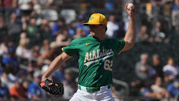 Mar 2, 2025; Mesa, Arizona, USA; Oakland Athletics pitcher Matt Krook throws against the Los Angeles Dodgers in the fifth inning at Hohokam Stadium. Mandatory Credit: Rick Scuteri-Imagn Images