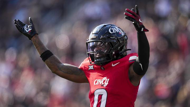 Oct 11, 2025; Cincinnati, Ohio, USA; Cincinnati Bearcats cornerback Matthew McDoom (0) reacts during a stop in play against the UCF Knights in the second half at Nippert Stadium. Mandatory Credit: Aaron Doster-Imagn Images