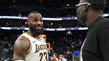 Jan 25, 2025; San Francisco, California, USA; Los Angeles Lakers forward LeBron James (23) talks with Golden State Warriors forward Draymond Green (right) after the game at Chase Center. Mandatory Credit: Darren Yamashita-Imagn Images