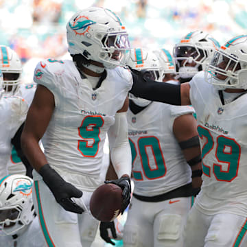 Miami Dolphins safety Ifeatu Melifonwu (9) celebrates safety Minkah Fitzpatrick (29) after an interception against the Buffalo Bills during the second half at Hard Rock Stadium. 