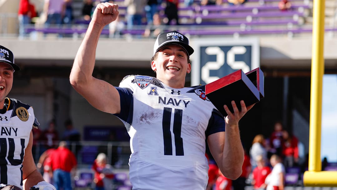 Dec 27, 2024; Fort Worth, TX, USA; Navy Midshipmen quarterback Blake Horvath (11) celebrates winning the MVP after the game against the Oklahoma Sooners at Amon G. Carter Stadium. Dec 27, 2024; Fort Worth, TX, USA; Navy Midshipmen quarterback Blake Horvath (11) celebrates winning the MVP after the game against the Oklahoma Sooners at Amon G. Carter Stadium.