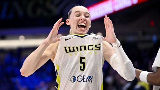 Dallas Wings guard Paige Bueckers (5) celebrates after the game against the Phoenix Mercury at College Park Center.