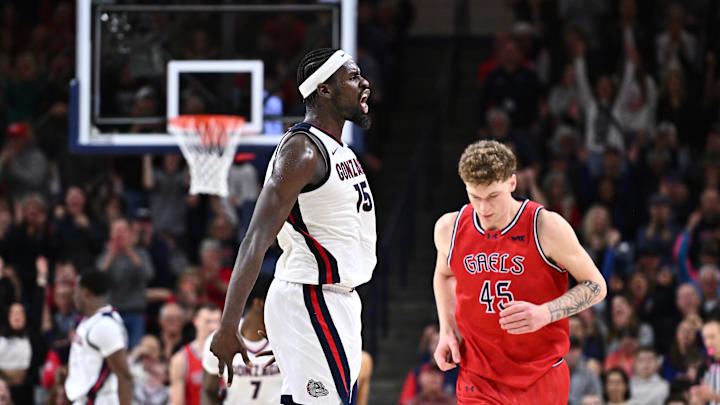 Jan 31, 2026; Spokane, Washington, USA; Gonzaga Bulldogs forward Graham Ike (15) celebrates a three-point basket against Saint Mary's Gaels center Andrew McKeever (45) in the second half at McCarthey Athletic Center. Gonzaga Bulldogs won 73-65. Mandatory Credit: James Snook-Imagn Images