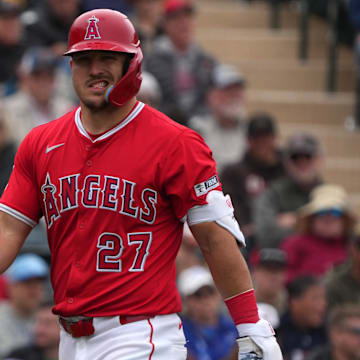 Mar 14, 2025; Tempe, Arizona, USA; Los Angeles Angels outfielder Mike Trout (27) reacts after getting called out on strikes against the Kansas City Royals in the third inning at Tempe Diablo Stadium. Mandatory Credit: Rick Scuteri-Imagn Images