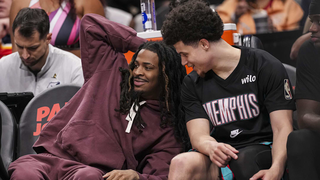 Mar 23, 2026; Atlanta, Georgia, USA; Memphis Grizzlies guard Ja Morant (12) on the bench with guard Walter Clayton Jr. (4) during the game against the Atlanta Hawks during the second half at State Farm Arena. Mandatory Credit: Dale Zanine-Imagn Images