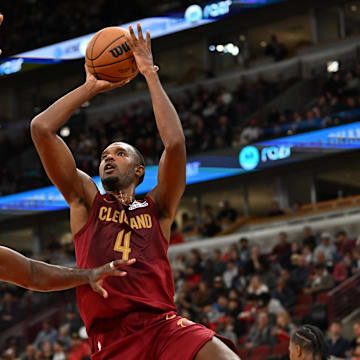 Oct 9, 2025; Chicago, Illinois, USA; Cleveland Cavaliers forward Evan Mobley (4) goes up for a shot against Chicago Bulls forward Patrick Williams (44) during the first half at United Center. Mandatory Credit: Patrick Gorski-Imagn Images