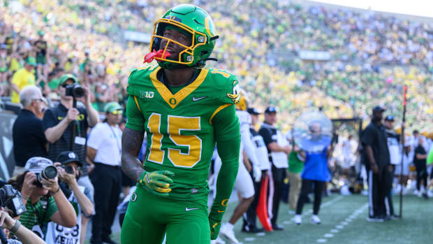  Oregon Ducks wide receiver Tez Johnson (15) celebrates a touchdown during the first quarter