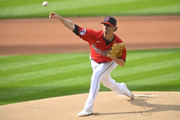 Shane Bieber throws a pitch 