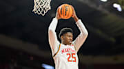 Jan 19, 2025; College Park, Maryland, USA; Maryland Terrapins center Derik Queen (25) rebounds the ball during the first half against the Nebraska Cornhuskers at Xfinity Center. Mandatory Credit: Reggie Hildred-Imagn Images