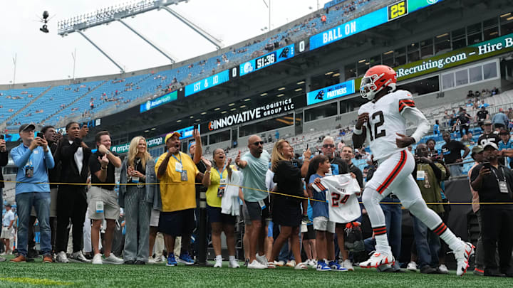 Aug 8, 2025; Charlotte, North Carolina, USA; Cleveland Browns quarterback Shedeur Sanders (12) runs on to the field before the game at Bank of America Stadium. Mandatory Credit: Bob Donnan-Imagn Images Aug 8, 2025; Charlotte, North Carolina, USA; Cleveland Browns quarterback Shedeur Sanders (12) runs on to the field before the game at Bank of America Stadium. Mandatory Credit: Bob Donnan-Imagn Images
