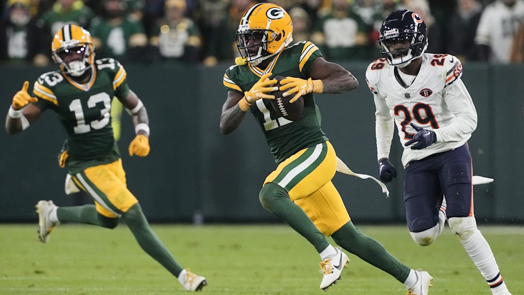 Jayden Reed races away from Bears cornerback Tyrique Stevenson. Reed could be activated from IR to face the Bears.