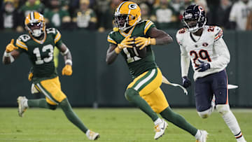 Jayden Reed races away from Bears cornerback Tyrique Stevenson. Reed could be activated from IR to face the Bears.