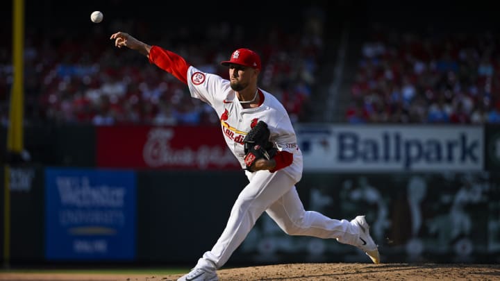 Aug 5, 2024; St. Louis, Missouri, USA;  St. Louis Cardinals relief pitcher Shawn Armstrong (30) pitches against the New York Mets during the sixth inning at Busch Stadium. Mandatory Credit: Jeff Curry-USA TODAY Sports