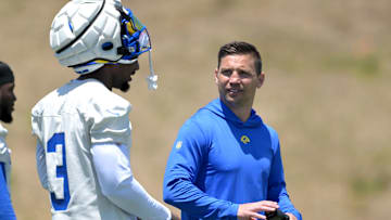 May 28, 2024; Thousand Oaks, CA, USA; Los Angeles Rams defensive coordinator Chris Shula talks with defensive back Kamren Curl (3) during OTAs at the team training facility at California Lutheran University. Mandatory Credit: Jayne Kamin-Oncea-USA TODAY Sports