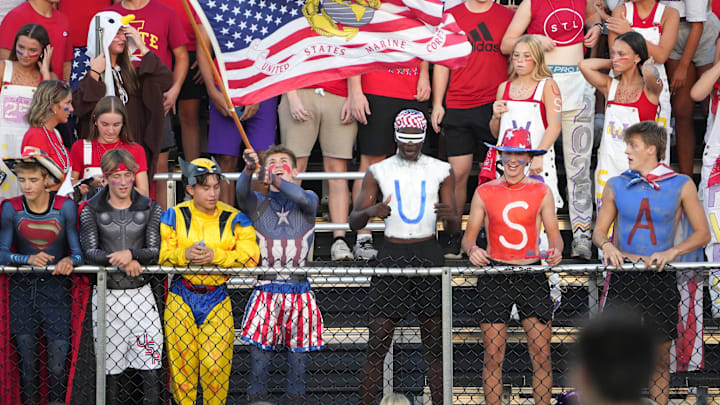 Festive football fans gather in the stands at Valley Stadium in West Des Moines prior to the kickoff of a Class 5A Iowa high school football game between Waukee and Valley on Friday, Sept. 20, 2024.
