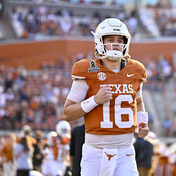 Dec 21, 2024; Austin, Texas, USA; Texas Longhorns quarterback Arch Manning (16) takes the field before the game between the Texas Longhorns and the Clemson Tigers in the CFP National Playoff First Round at Darrell K Royal-Texas Memorial Stadium. Mandatory Credit: Jerome Miron-Imagn Images