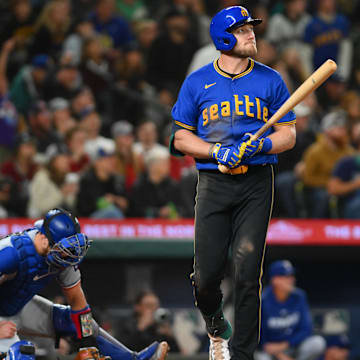 Seattle Mariners left fielder Luke Raley watches as his home run goes out of the park during a game against the Texas Rangers on Saturday at T-Mobile Park.