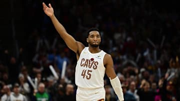 Dec 20, 2024; Cleveland, Ohio, USA; Cleveland Cavaliers guard Donovan Mitchell (45) celebrates after hitting a three point basket during the second half against the Milwaukee Bucks at Rocket Mortgage FieldHouse. Mandatory Credit: Ken Blaze-Imagn Images