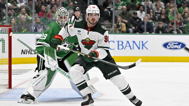 Apr 19, 2023; Dallas, Texas, USA; Minnesota Wild left wing Marcus Johansson (90) skates in front of