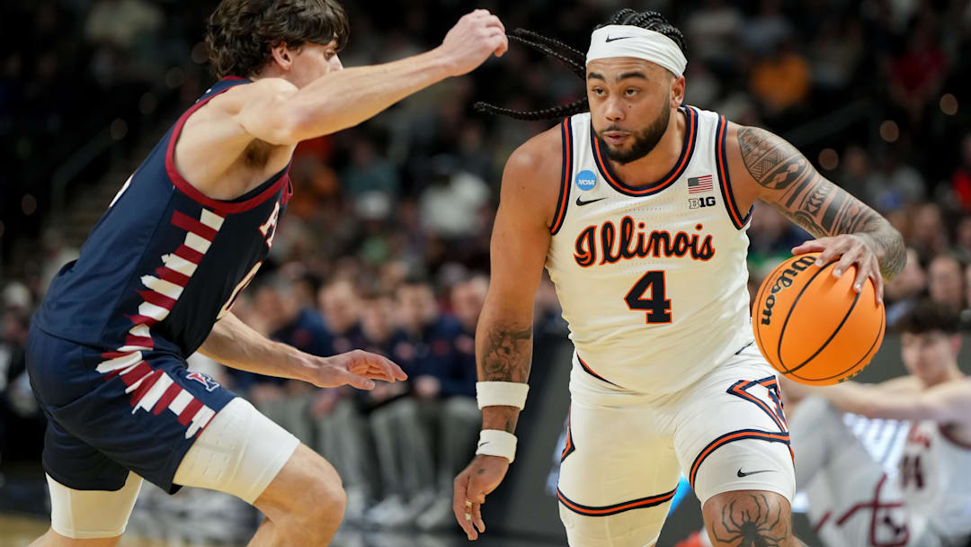 Mar 19, 2026; Greenville, SC, USA; Illinois Fighting Illini guard Kylan Boswell (4) dribbles the ball against the Penn Quakers in the first half of a first round game of the men's 2026 NCAA Tournament at Bon Secours Wellness Arena. Mandatory Credit: Bob Donnan-Imagn Images