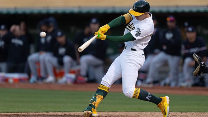Jun 21, 2024; Oakland, California, USA; Oakland Athletics first base Tyler Soderstrom (21) hits a two RBI double against the Minnesota Twins during the fifth inning at Oakland-Alameda County Coliseum. Mandatory Credit: Stan Szeto-USA TODAY Sports