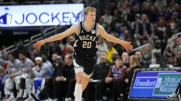 Milwaukee Bucks guard AJ Green (20) reacts after scoring a basket  against the Philadelphia 76ers in 2023-24.