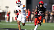 Cincinnati Bearcats wide receiver Caleb Goodie (10) catches a pass and runs for a touchdown as Iowa State Cyclones defensive back Jamison Patton (2) defends in the fourth quarter of the NCAA football game between the Cincinnati Bearcats and Iowa State Cyclones at Nippert Stadium in Cincinnati on Oct. 4, 2025.
