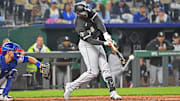 Chicago White Sox center fielder Luis Robert Jr. (88) singles against the Kansas City Royals at Kauffman Stadium. 
