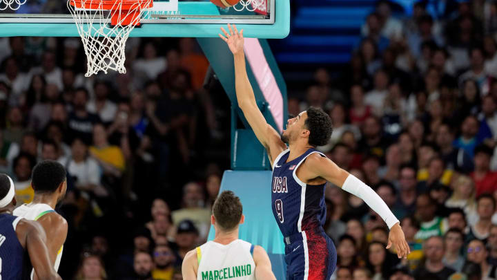 Aug 6, 2024; Paris, France; United States guard Tyrese Haliburton (9) shoots against Brazil in the fourth quarter in a men’s basketball quarterfinal game during the Paris 2024 Olympic Summer Games at Accor Arena. Mandatory Credit: Kyle Terada-USA TODAY Sports