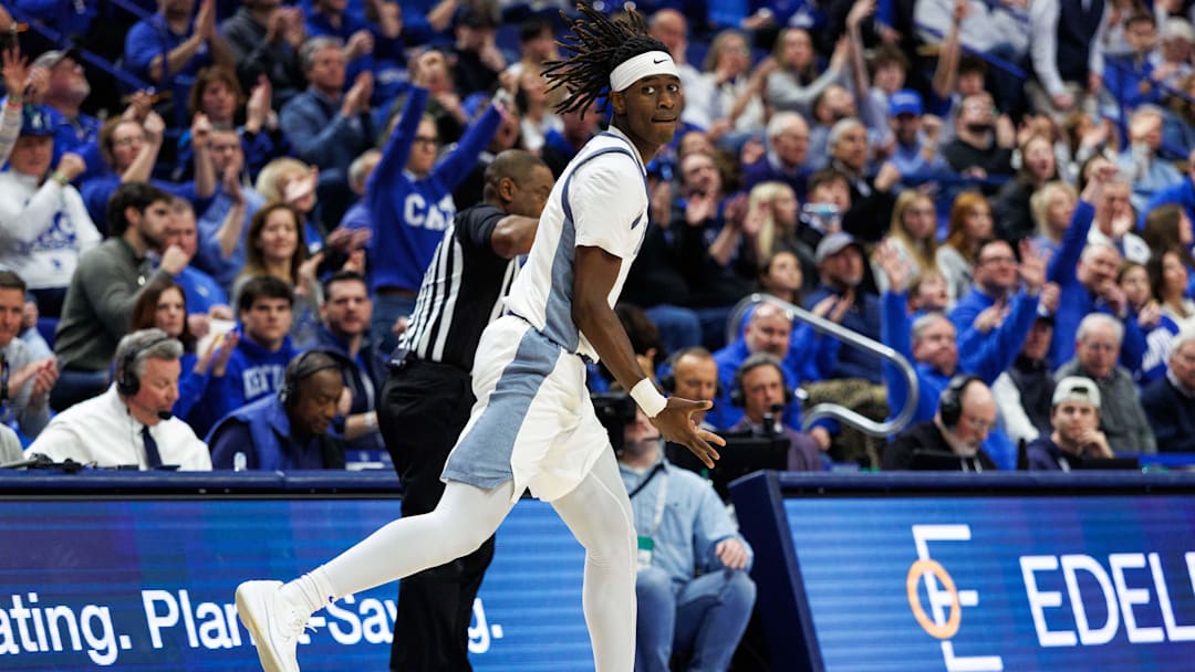 Feb 7, 2026; Lexington, Kentucky, USA; Kentucky Wildcats guard Denzel Aberdeen (1) celebrates a three-point basket during the second half against the Tennessee Volunteers.