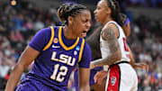 Mar 28, 2025; Spokane, WA, USA; LSU Lady Tigers guard Mikaylah Williams (12) celebrates a basket during the second half of a Sweet 16 NCAA Tournament basketball game against the NC State Wolfpack at Spokane Arena. Mandatory Credit: James Snook-Imagn Images