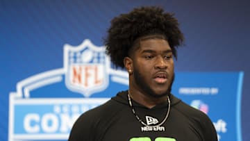 Mar 1, 2025; Indianapolis, IN, USA; University of Alabama offensive lineman Tyler Booker (OL03) answers questions at a press conference during the 2025 NFL Combine at Indiana Convention Center.  