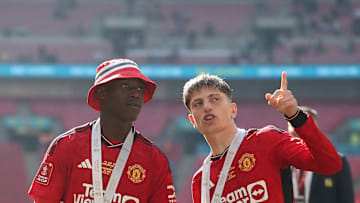 Manchester United duo Kobbie Mainoo and Alejandro Garnacho after winning the FA Cup