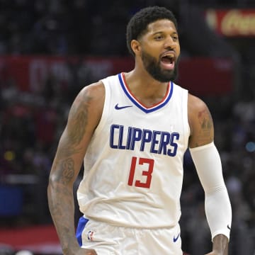 Los Angeles Clippers forward Paul George (13) celebrates after a three point basket in the fourth quarter against the Cleveland Cavaliers at Crypto.com Arena. Mandatory Credit: