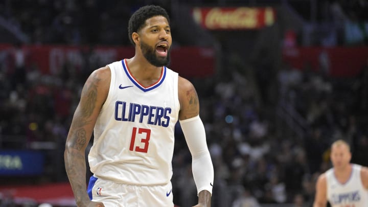 Los Angeles Clippers forward Paul George (13) celebrates after a three point basket in the fourth quarter against the Cleveland Cavaliers at Crypto.com Arena. Mandatory Credit: