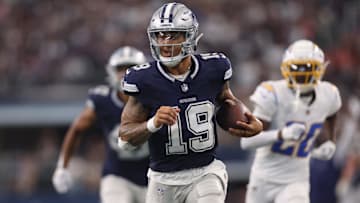 Aug 24, 2024; Arlington, Texas, USA; Dallas Cowboys quarterback Trey Lance (19) runs for a touchdown against the Los Angeles Chargers in the third quarter at AT&T Stadium. Mandatory Credit: Tim Heitman-Imagn Images