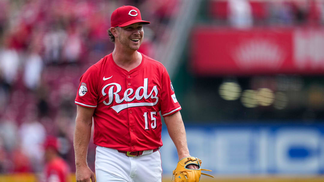 Cincinnati Reds relief pitcher Emilio Pagan (15) smiles after the final out of the ninth inning of the MLB National League game between the Cincinnati Reds and the Pittsburgh Pirates at Great American Ball Park in downtown Cincinnati on Thursday, Sept. 25, 2025. The Reds won, 2-1.