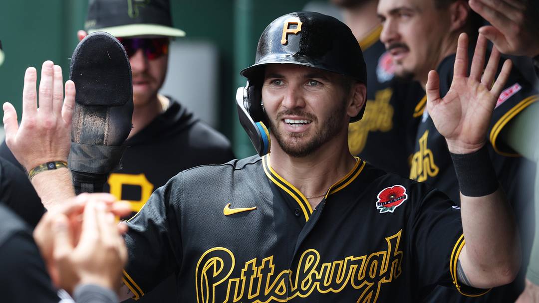 May 25, 2026; Pittsburgh, Pennsylvania, USA; Pittsburgh Pirates first baseman Spencer Horwitz (2) celebrates with teammates in the dugout after scoring a run on the RBI single hit by infielder Brandon Lowe (5) against Chicago Cubs pitcher Ben Brown (not pictured) during the third inning at PNC Park. Mandatory Credit: Charles LeClaire-Imagn Images