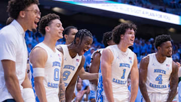 Nov 14, 2025; Chapel Hill, North Carolina, USA; North Carolina Tar Heels forward Caleb Wilson (8) and the Carolina bench celebrate in the second half against the North Carolina Central Eagles at Dean E. Smith Center. 