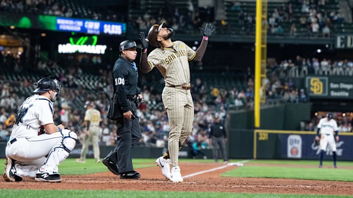 Sep 11, 2024; Seattle, Washington, USA;  San Diego Padres right fielder Fernando Tatis Jr. (23) celebrates after hitting a solo home run during the seventh inning against the Seattle Mariners at T-Mobile Park. 