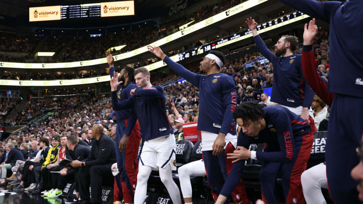 Apr 9, 2024; Salt Lake City, Utah, USA; The Denver Nuggets bench reacts to a three point shot against the Utah Jazz during the second quarter at Delta Center. Mandatory Credit: Rob Gray-USA TODAY Sports