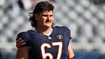 Oct 15, 2023; Chicago, Illinois, USA;  Chicago Bears offensive lineman Dan Feeney (67) warms up before a game against the Minnesota Vikings at Soldier Field. Mandatory Credit: Jamie Sabau-Imagn Images